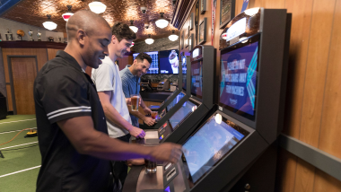 Guy placing bet at sportsbook counter