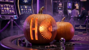 A illuminated pumpkin on a table in a casino