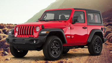 red jeep wrangler in a desert